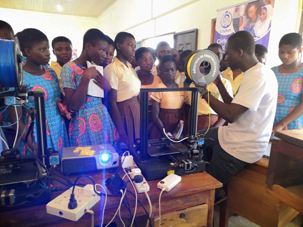 Young Ghanaian girls learning coding and robotics in a STEM classroom